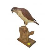 Carved falcon by Bill Hickson, 11" H. including