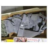 Grey gun vest with 12 Ga. ammo