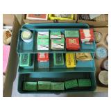 Box of bullets and primers: bullets are .22 and