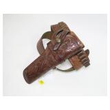 Tooled leather holster and cartridge belt