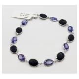 14K White gold oval cut bezel set sapphire and