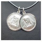 Sterling silver religious medals on leather cord