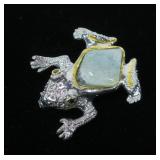 Sterling silver frog pin with aquamarine body and