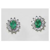 Sterling silver oval cut claw set emerald