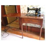 Vintage Singer sewing machine with stand