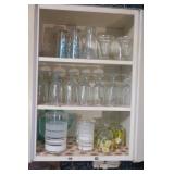 Contents of 5 kitchen cabinets includes: