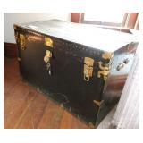 Large trunk with tray and assorted vintage linens