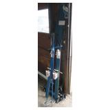 Pair of Holiday K2 Tyrolia 420 skis with poles