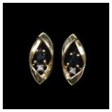 10K Yellow gold post earrings with oval cut blue