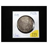 1928 Peace dollar, Unc., key