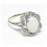 14K White gold cabochon opal ring with round cut