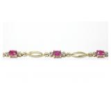 10K Yellow gold 7" oval cut ruby bracelet with