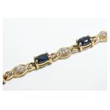 10K Yellow gold 7.25" oval cut blue topaz bracelet