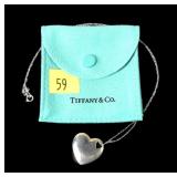 Sterling silver Tiffany & Co. solid heart pendant
