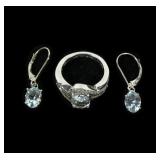 Sterling silver oval cut aquamarine ring in bypass