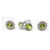 Sterling silver oval  cut peridot two-stone bypass