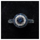 Sterling silver round brilliant cut blue diamond,