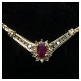 10K Yellow gold oval cut ruby pendant with round