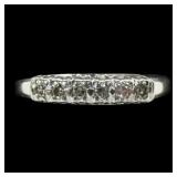 14K White gold band with six round brilliant cut