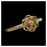 14K Yellow gold flower with round brilliant cut