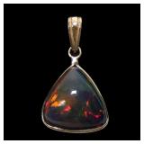 14K Yellow gold bezel set triangular cabochon