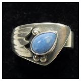 Sterling silver bezel set larimar in wrap setting,