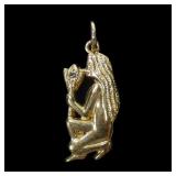 10K Yellow gold figural pendant with diamond