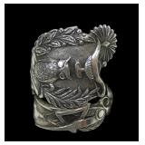 Sterling silver knowledge themed wrap style ring,