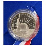 2- 1986 Liberty commemorative half dollars