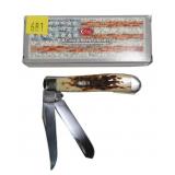 Case amber bone peach seed jig mini trapper