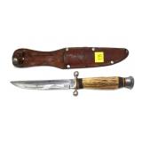 Puma vintage hunting knife with leather sheath,