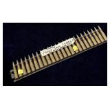 Lot, 24 Rds. of linked 8mm Lebel cartridges,24 Rds