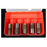 Set of chokes in container