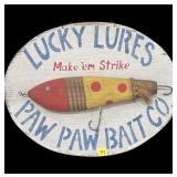 "Lucky Lures Paw Paw Bait Co." wooden sign,