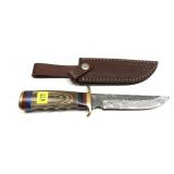 Custom Damascus steel knife with embossed