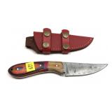 Custom Damascus steel knife with embossed