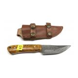 Custom Damascus steel knife with embossed