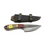 Custom Damascus steel knife with embossed