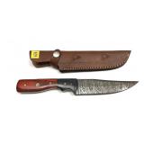 Custom Damascus steel knife with embossed