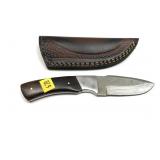 Custom Damascus steel knife with embossed