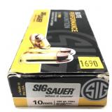 Box of 10mm 180-grain FMJ SIG Sauer cartridges,