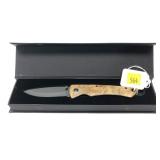 Stone River Gear ceramic folding knife with