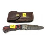 Custom handmade folding knife with Damascus