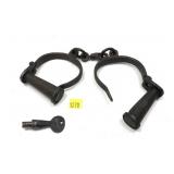 Pair of iron handcuffs marked Colorado