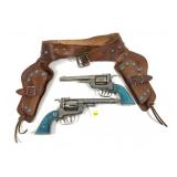 Pair of Texan 38 Cap guns in leather decorated