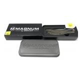 Magnum by Boker 440A folding knife in tin