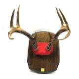 9-point rack on wooden plaque