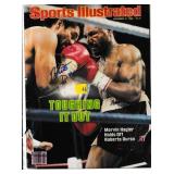 Lot, Roberto Duran autographs on 2 Sports