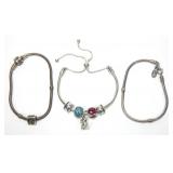 Lot, three Pandora sterling silver bracelets with