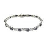 Sterling silver 7.25" oval cut dark blue topaz